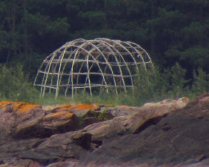 Frame of a sweat lodge in Lake Superior.